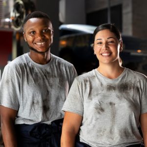 professional auto mechanic team standing